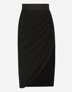 Asymmetrical jersey skirt with draping