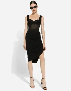 Asymmetrical jersey skirt with draping