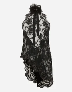 Asymmetrical lace top with flower detail on neck