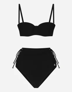 Balconette bikini top and laced high-waisted bikini bottoms