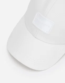 Baseball cap with branded tag