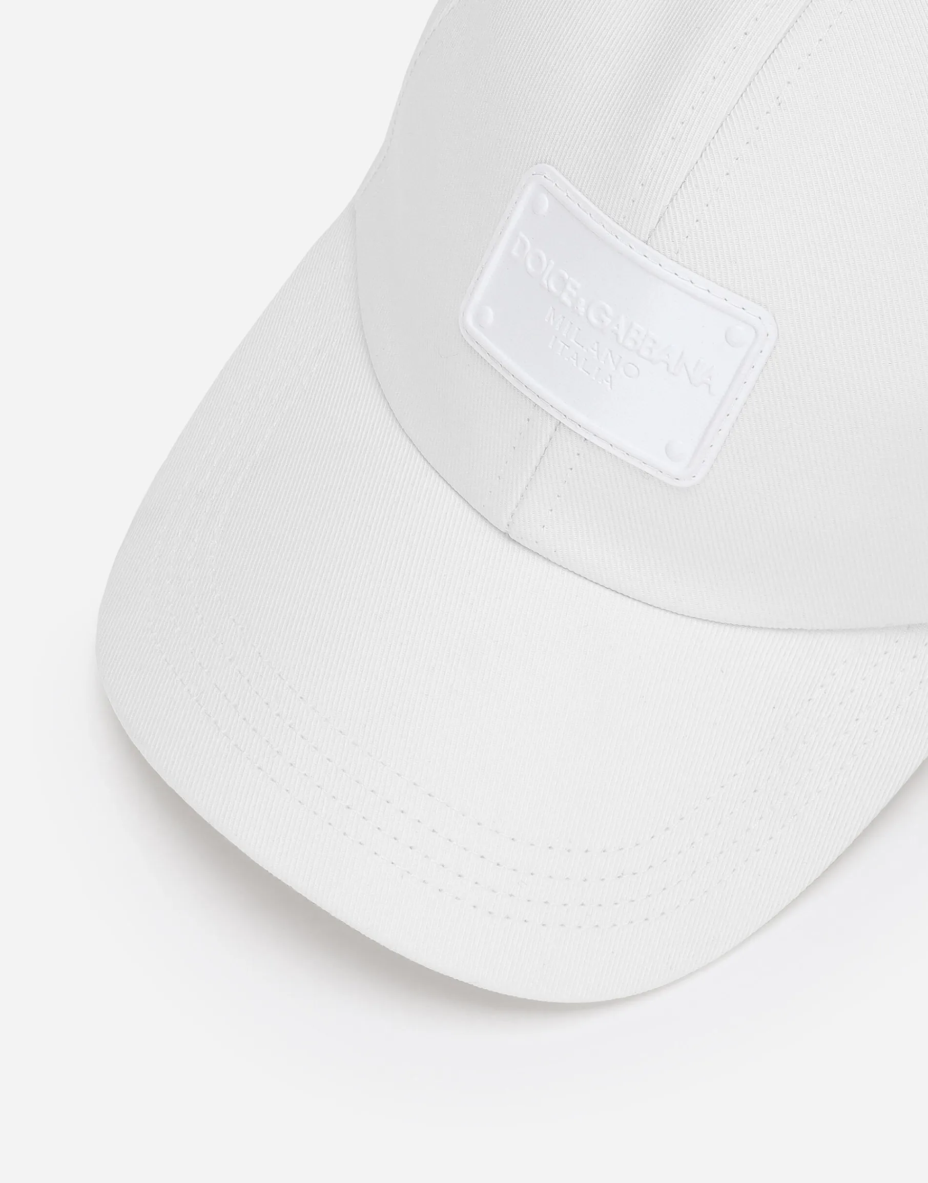 Baseball cap with branded tag