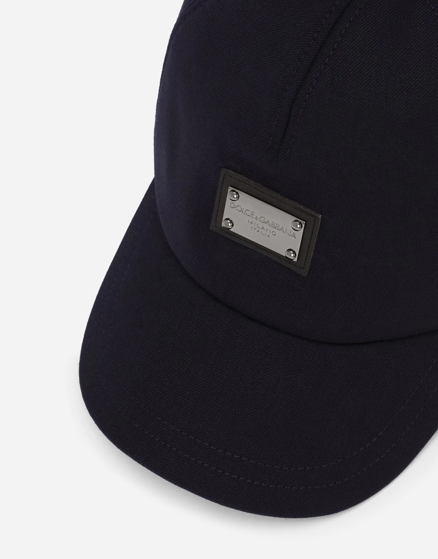 Baseball cap with logo tag