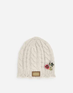 Cable-knit hat with logo tag and embroidery