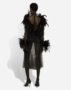 Calf-length stretch tulle dress with fusible rhinestones and rooster and ostrich feather embellishment