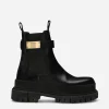 Calfskin ankle boots with branded strap