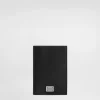 Calfskin passport holder with logo tag