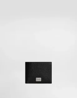 Calfskin wallet with coin pocket and logo tag