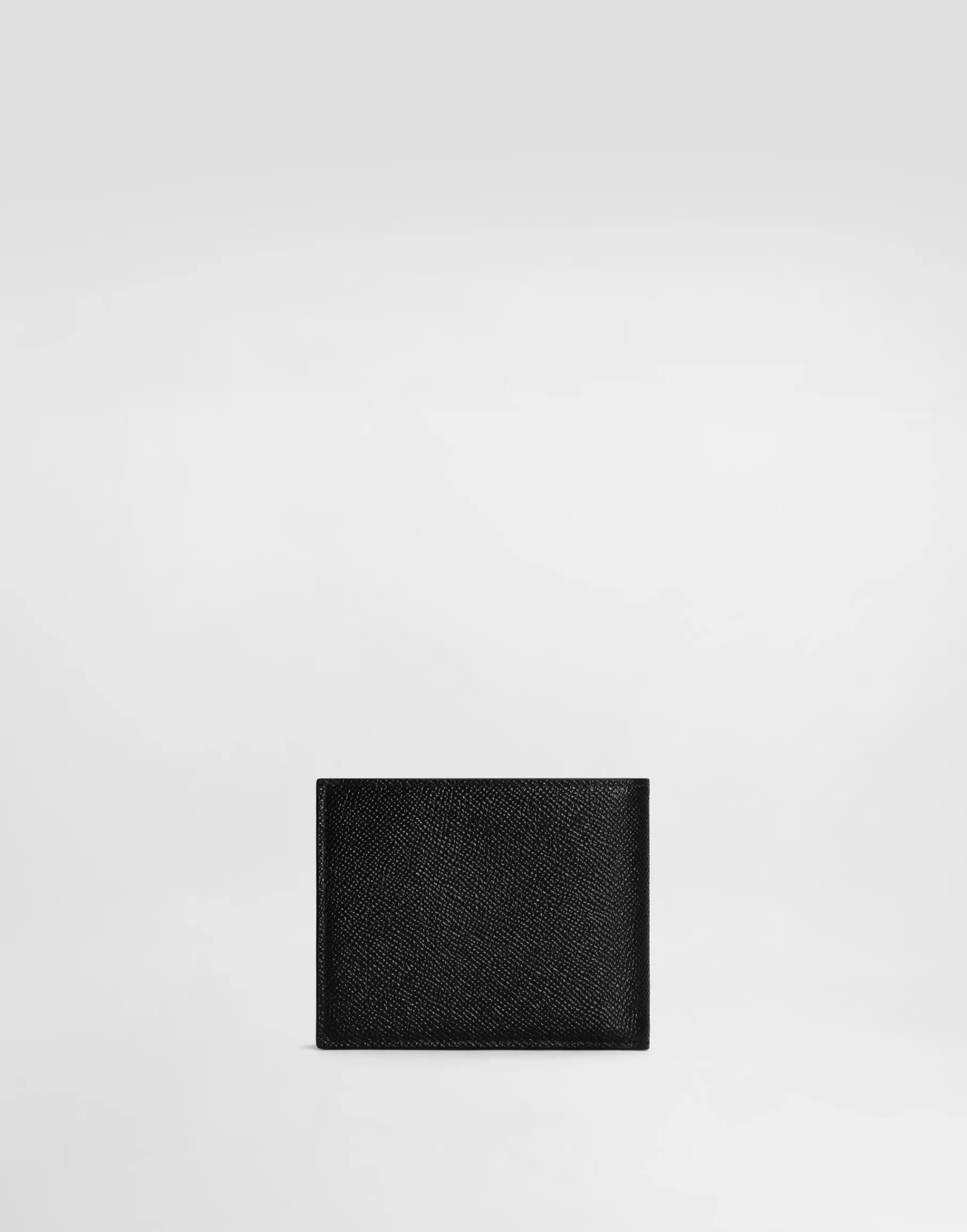 Calfskin wallet with coin pocket and logo tag