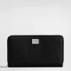 Calfskin zip-around wallet with branded plate