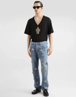 Classic cotton jeans with tag and bejeweled details