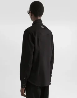 Coated black stretch denim shirt
