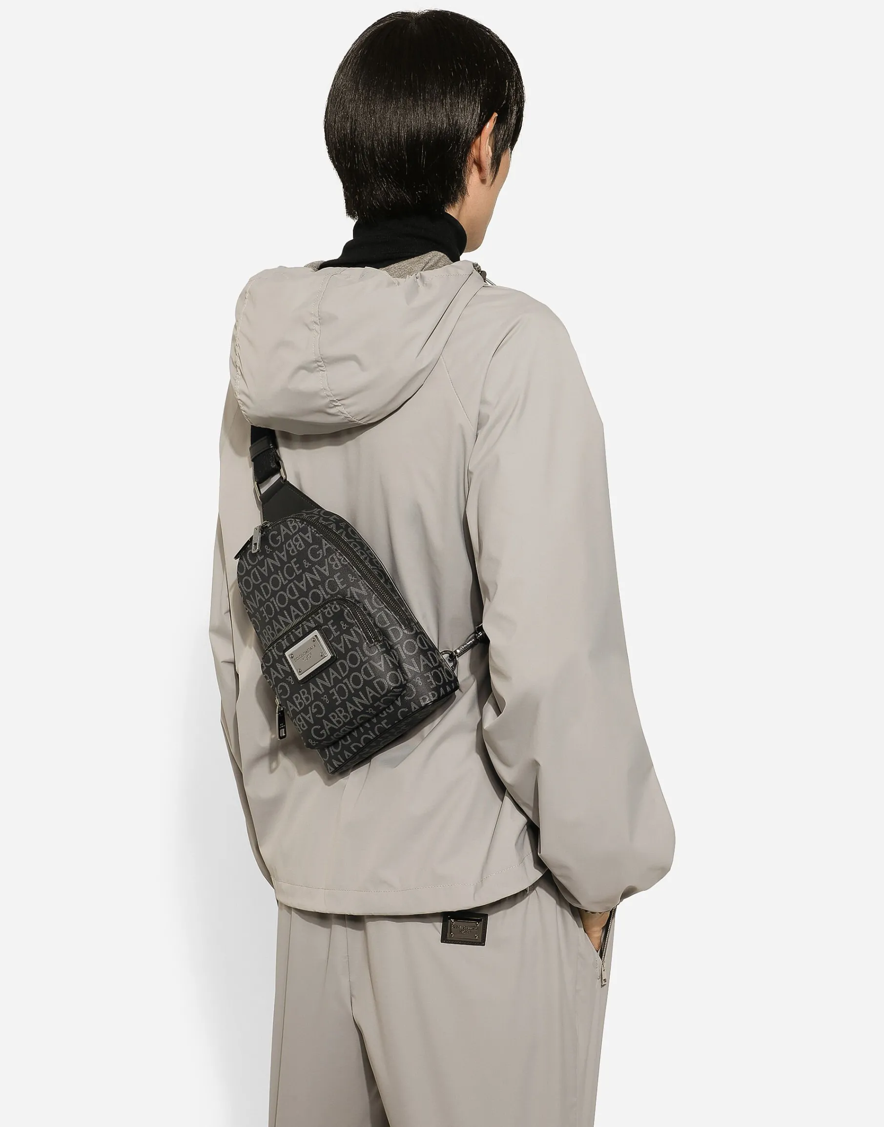 Coated jacquard crossbody backpack