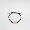 Cord bracelet with Dolce&Gabbana tag