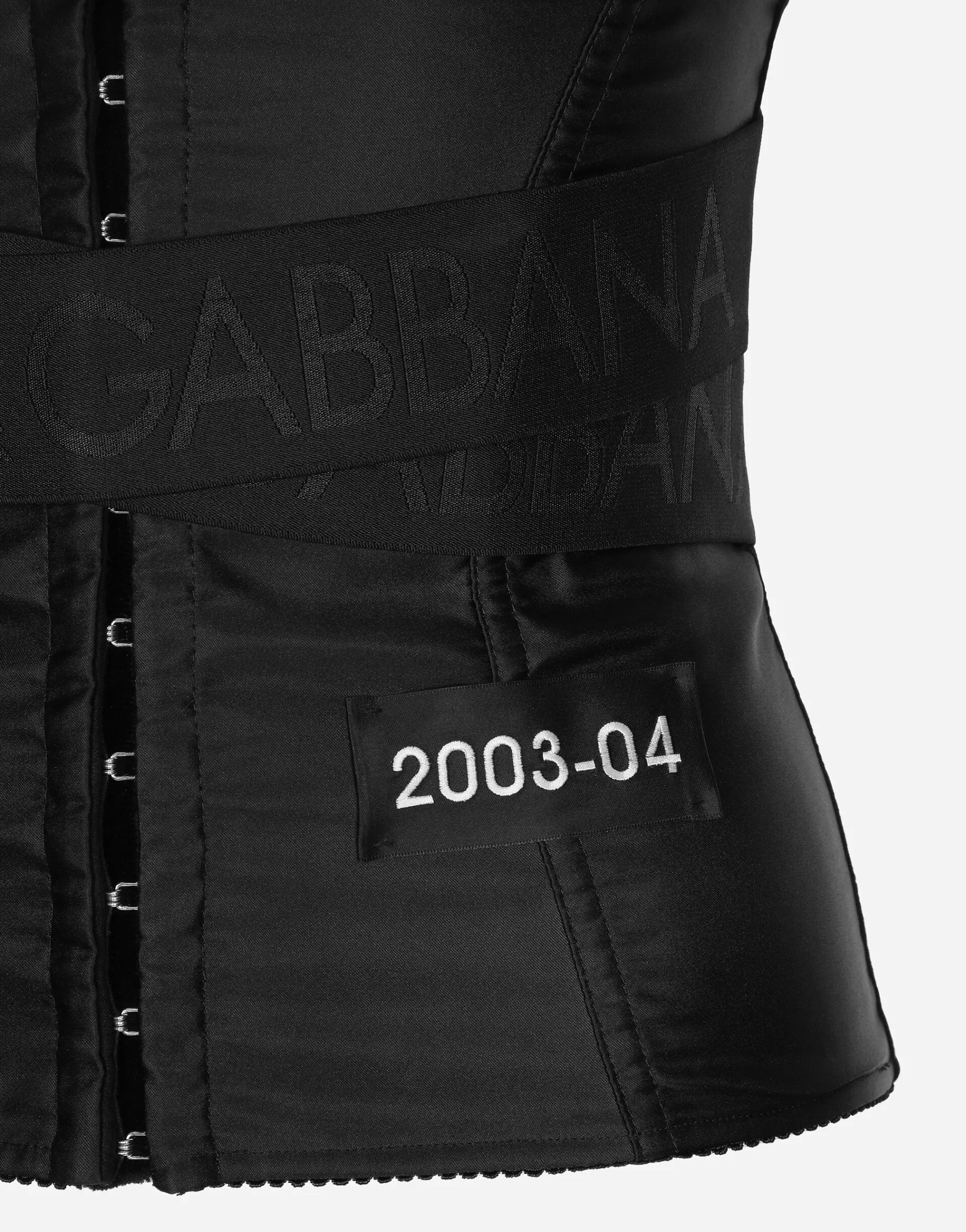 Corset-style belt with branded stretch crossover bands