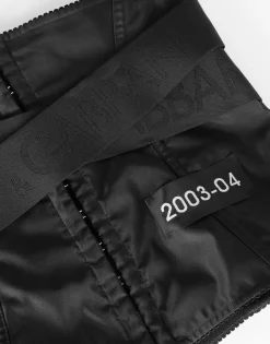 Corset-style belt with branded stretch crossover bands