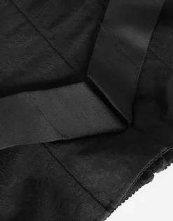 Corset-style belt with branded stretch crossover bands