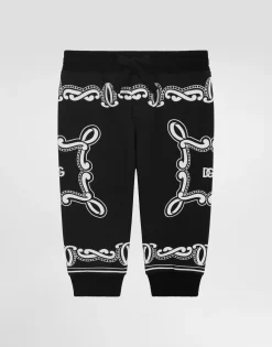 Cotton fleece jogging pants with bandanna print
