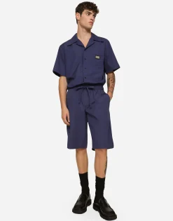 Cotton jogging shorts with logo tag