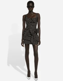 Cotton minidress with polka-dot print and bow detail