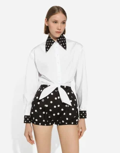 Cropped cotton poplin shirt with knot detail and polka-dot print