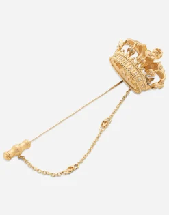Crown stick pin brooch in yellow and white gold with curly gold thread embellishments and sphere