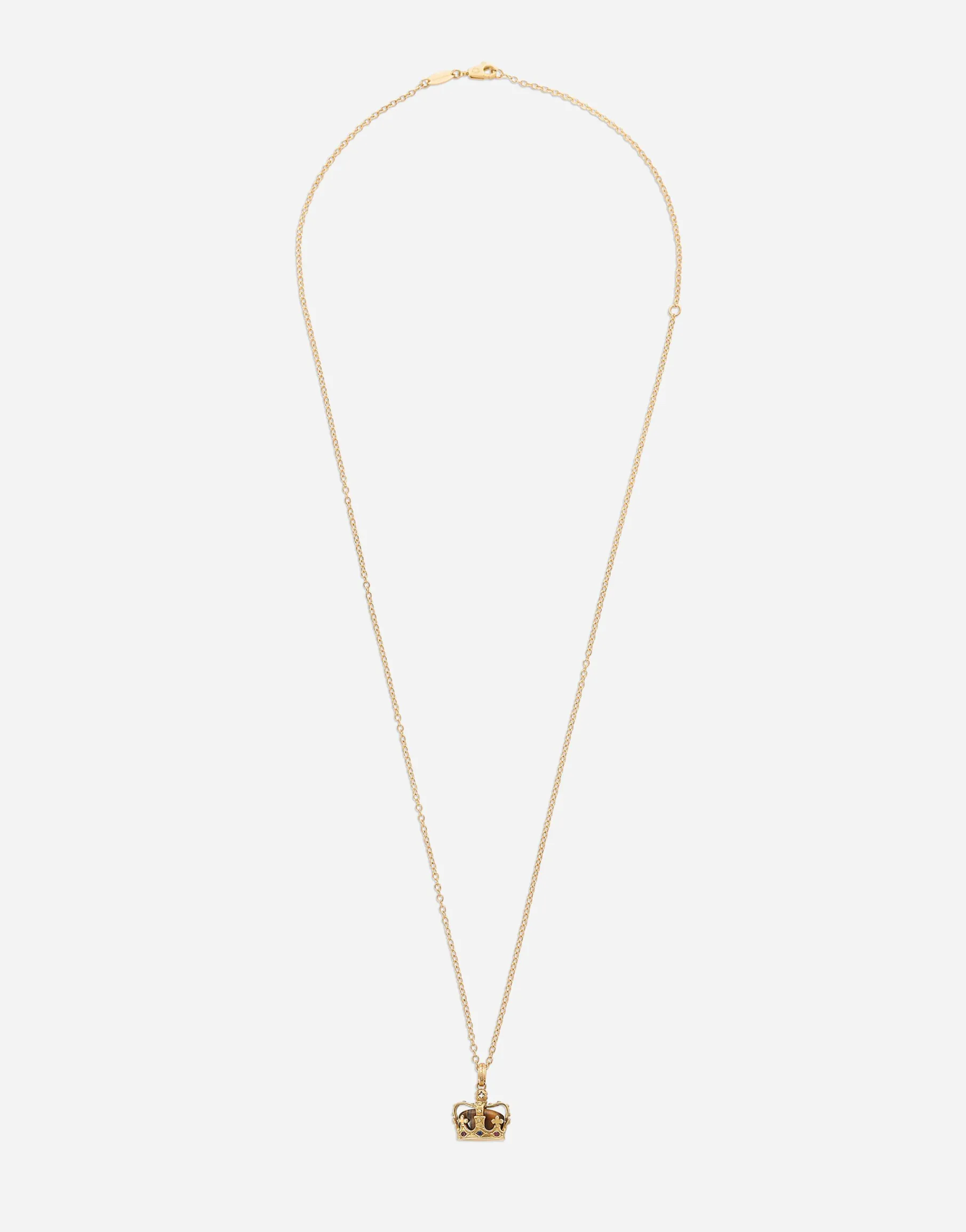 Crown yellow gold pendant with iron eye