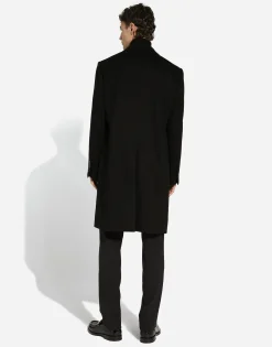 Deconstructed single-breasted wool coat