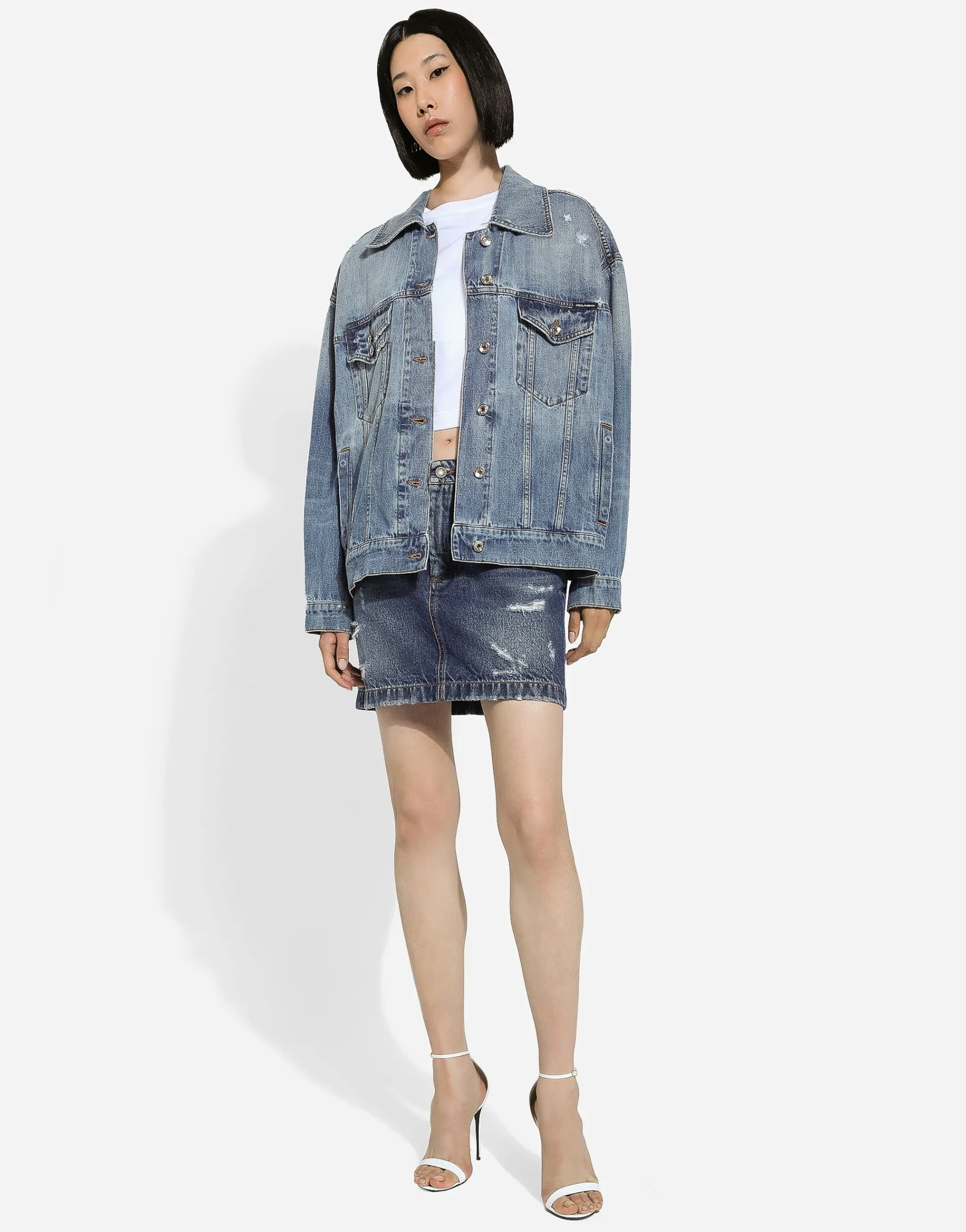 Denim jacket with branded plate
