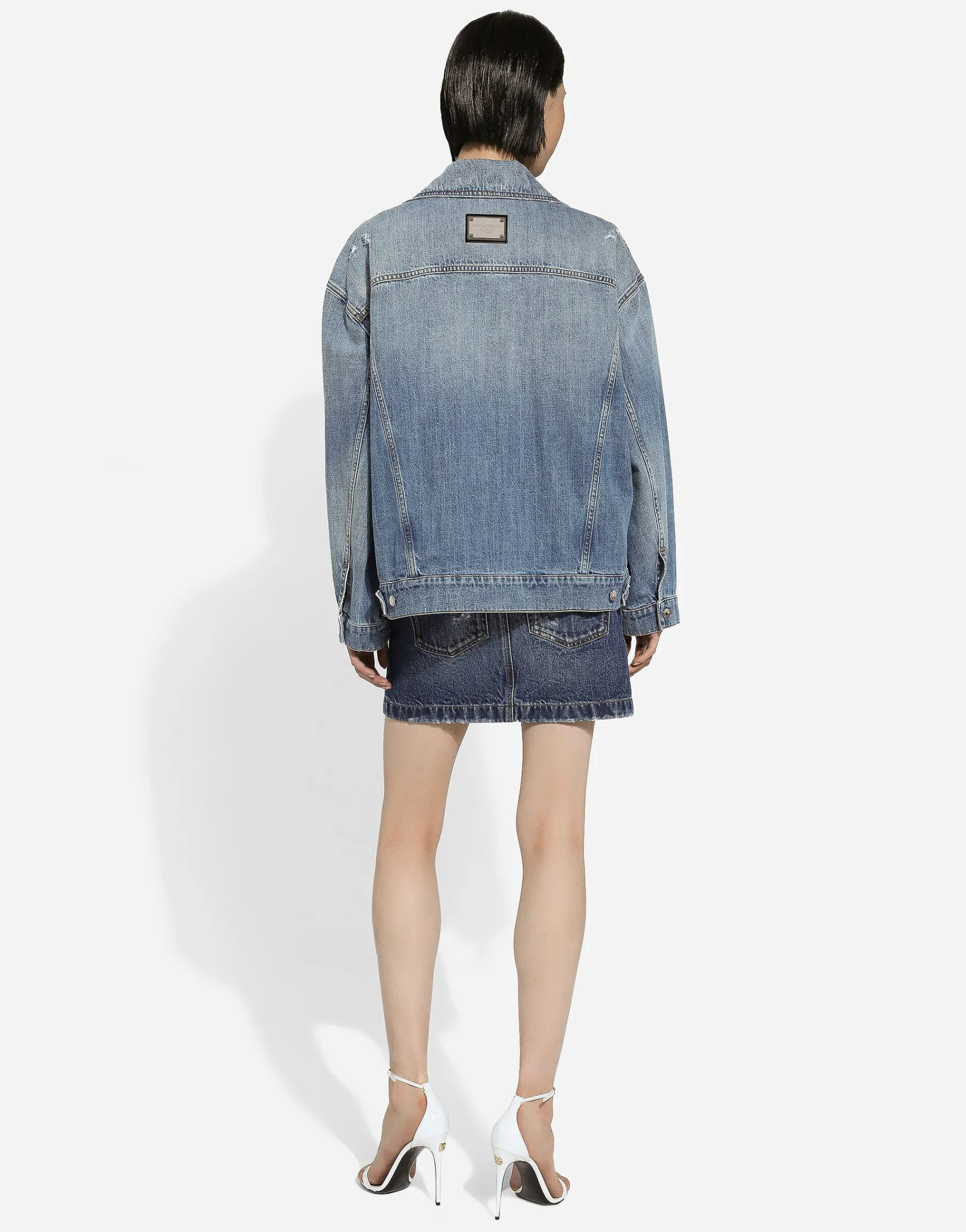 Denim jacket with branded plate