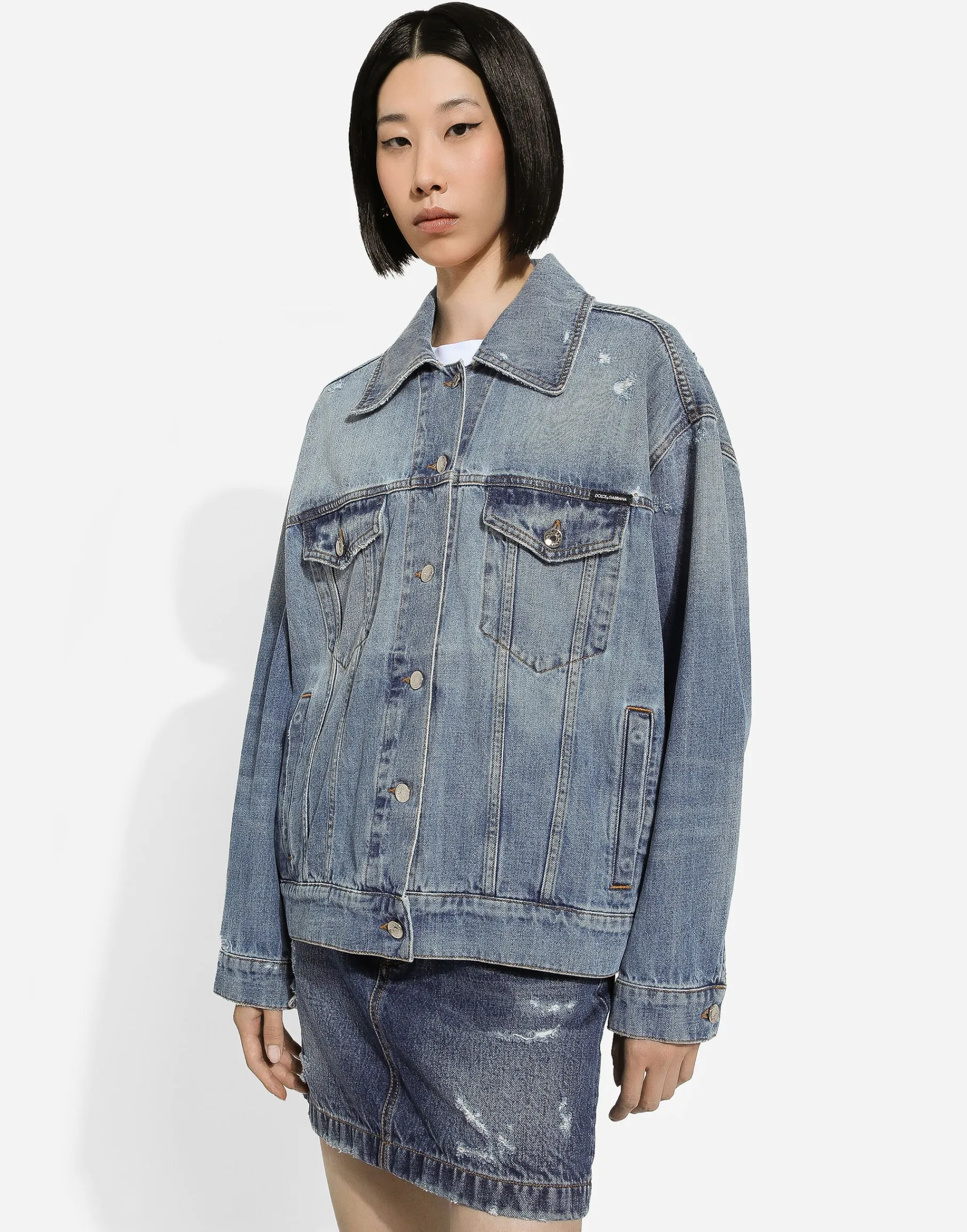 Denim jacket with branded plate