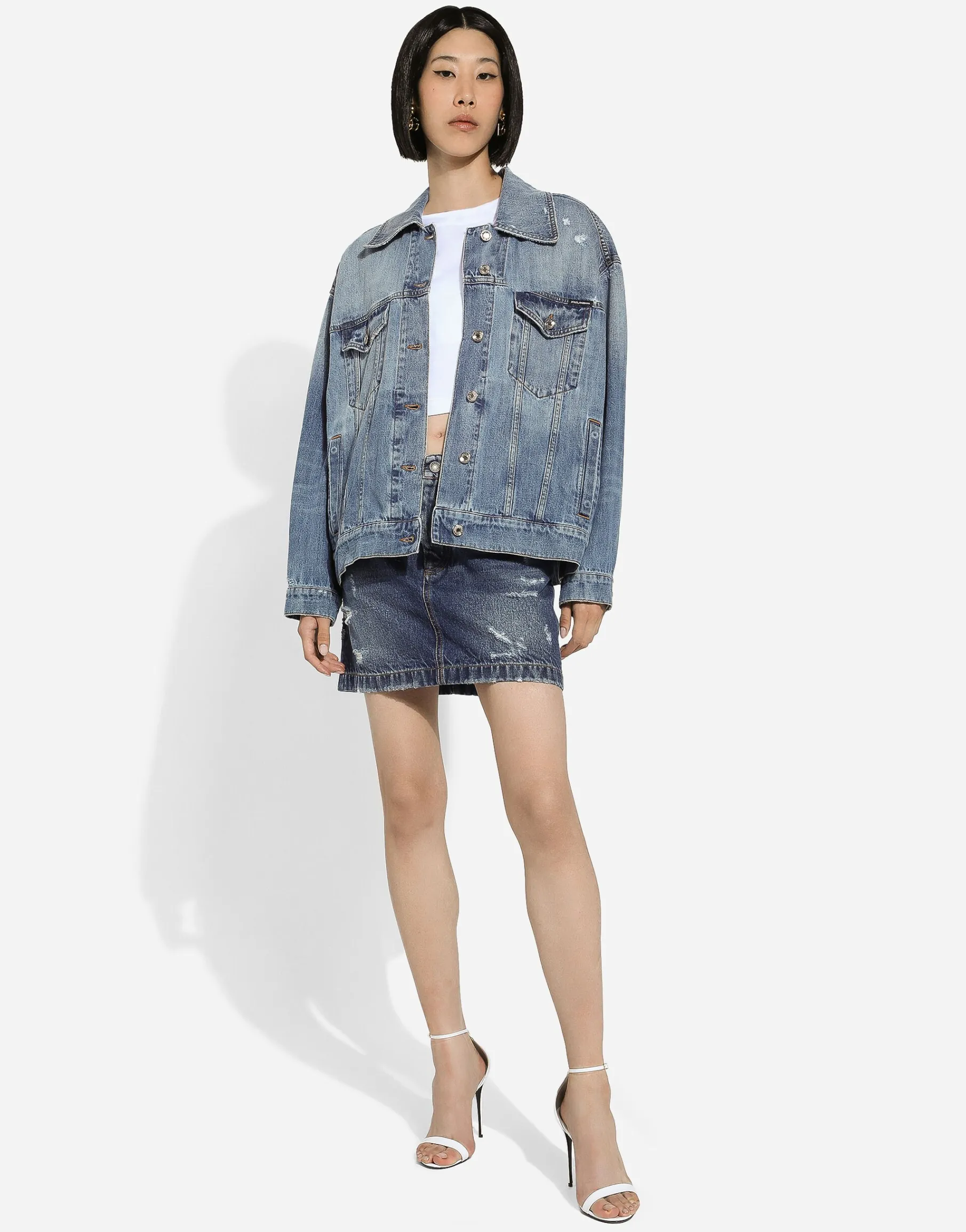Denim jacket with branded plate