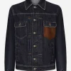 Denim jacket with embossed tag on leather