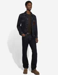 Denim jacket with embossed tag on leather