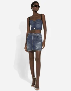 Denim mini skirt with rips