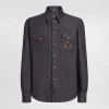 Denim shirt with heraldic emblem