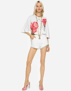 Denim shorts with ripped details and abrasions
