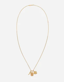 Devotion yellow and red gold rounded rectangular pendant with a red gold Virgin Mary medallion, horn and four-leaf clover pendants on yellow gold chain