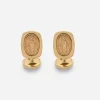 Devotion yellow gold cufflinks with a red gold Virgin Mary medallion
