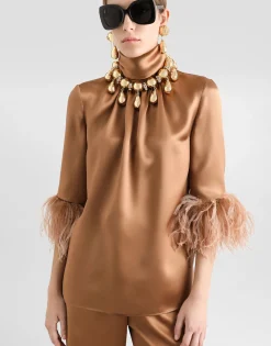 Double satin turtle-neck top with feathered detailing