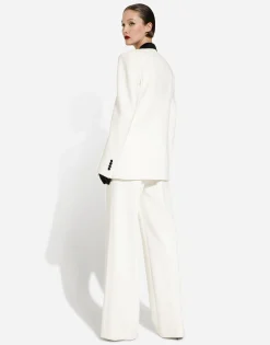 Double-breasted wool crepe jacket with tuxedo lapels