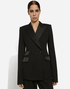 Double-breasted woolen jacket with side vents