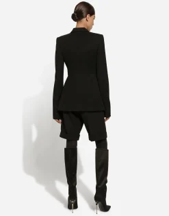 Double-breasted woolen jacket with side vents