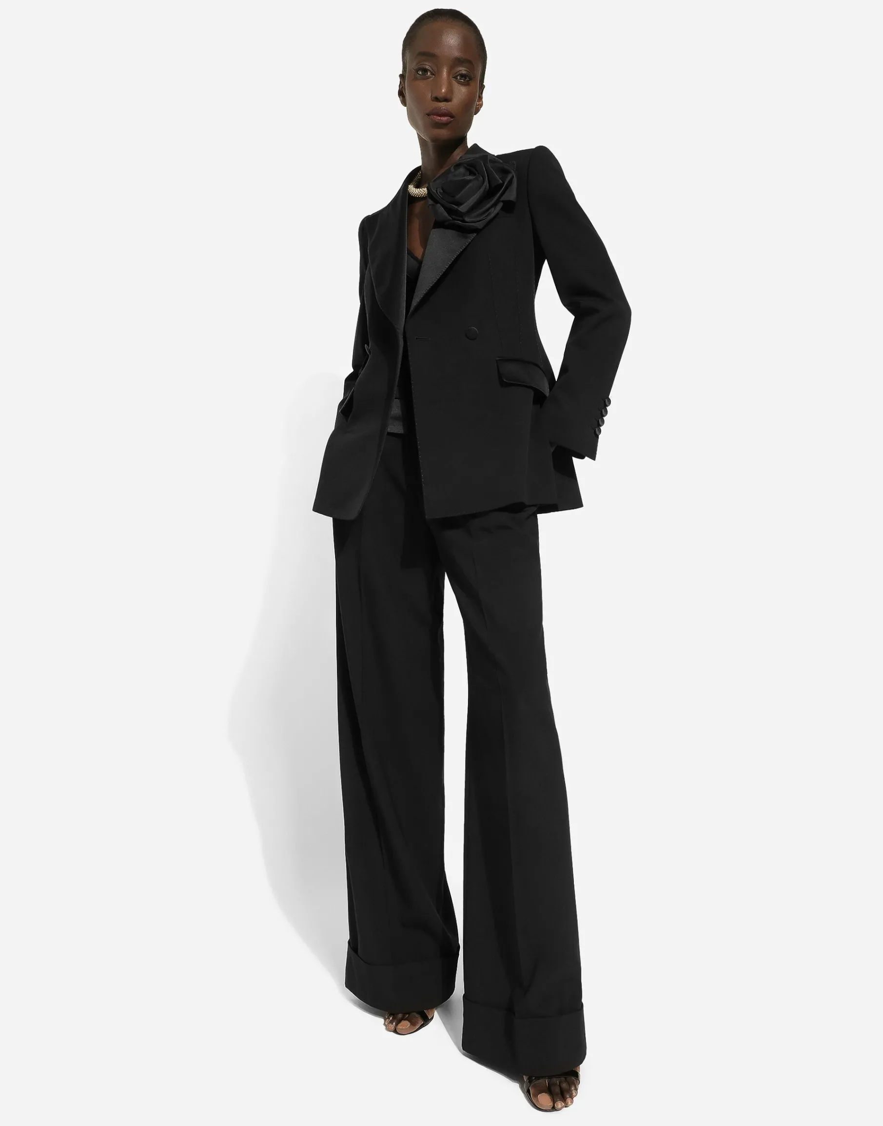 Double-breasted woolen jacket with flower appliqué