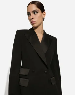 Double-breasted woolen jacket with side vents