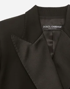 Double-breasted woolen jacket with side vents
