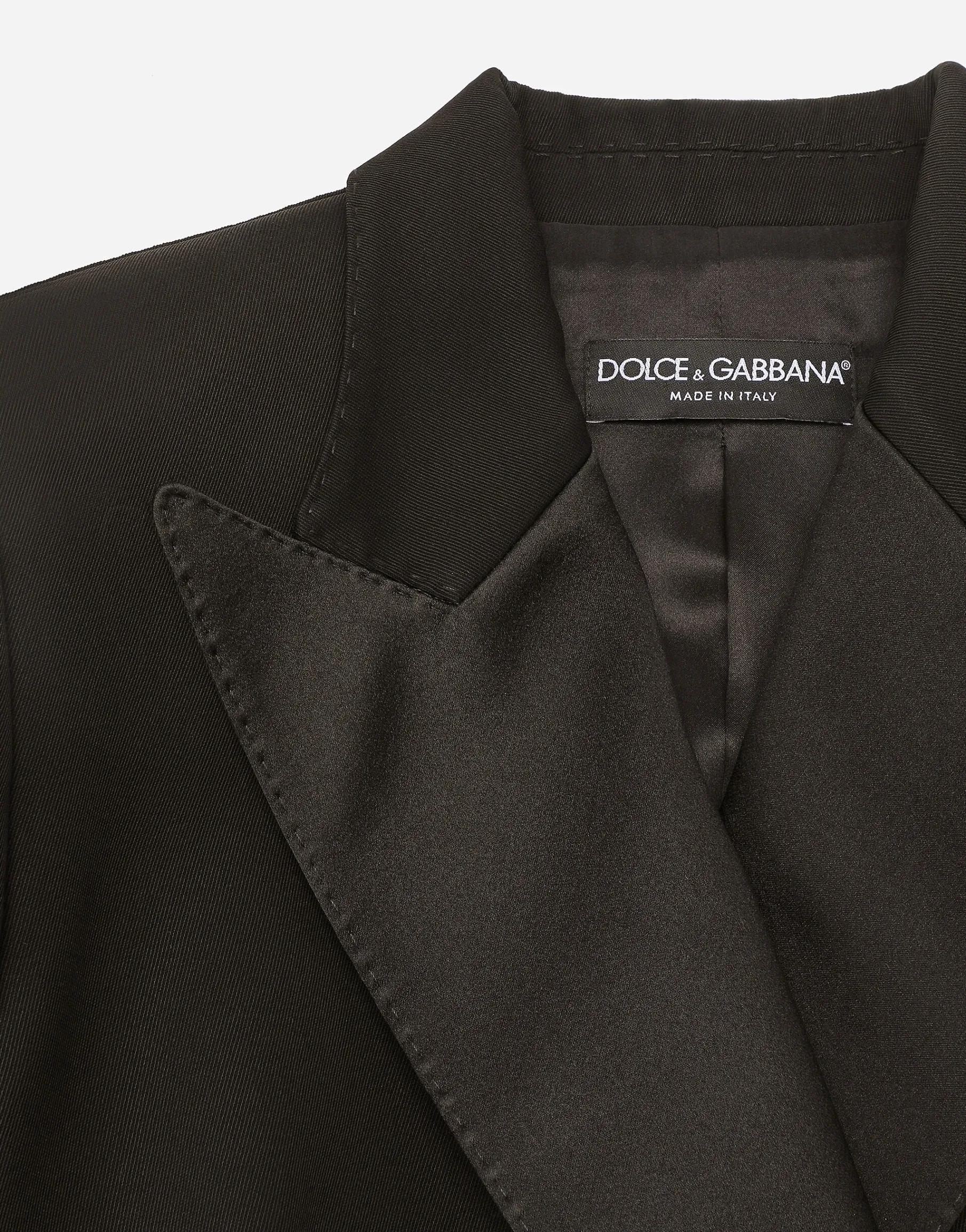 Double-breasted woolen jacket with side vents