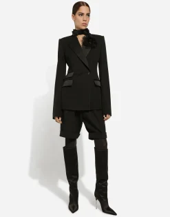 Double-breasted woolen jacket with side vents
