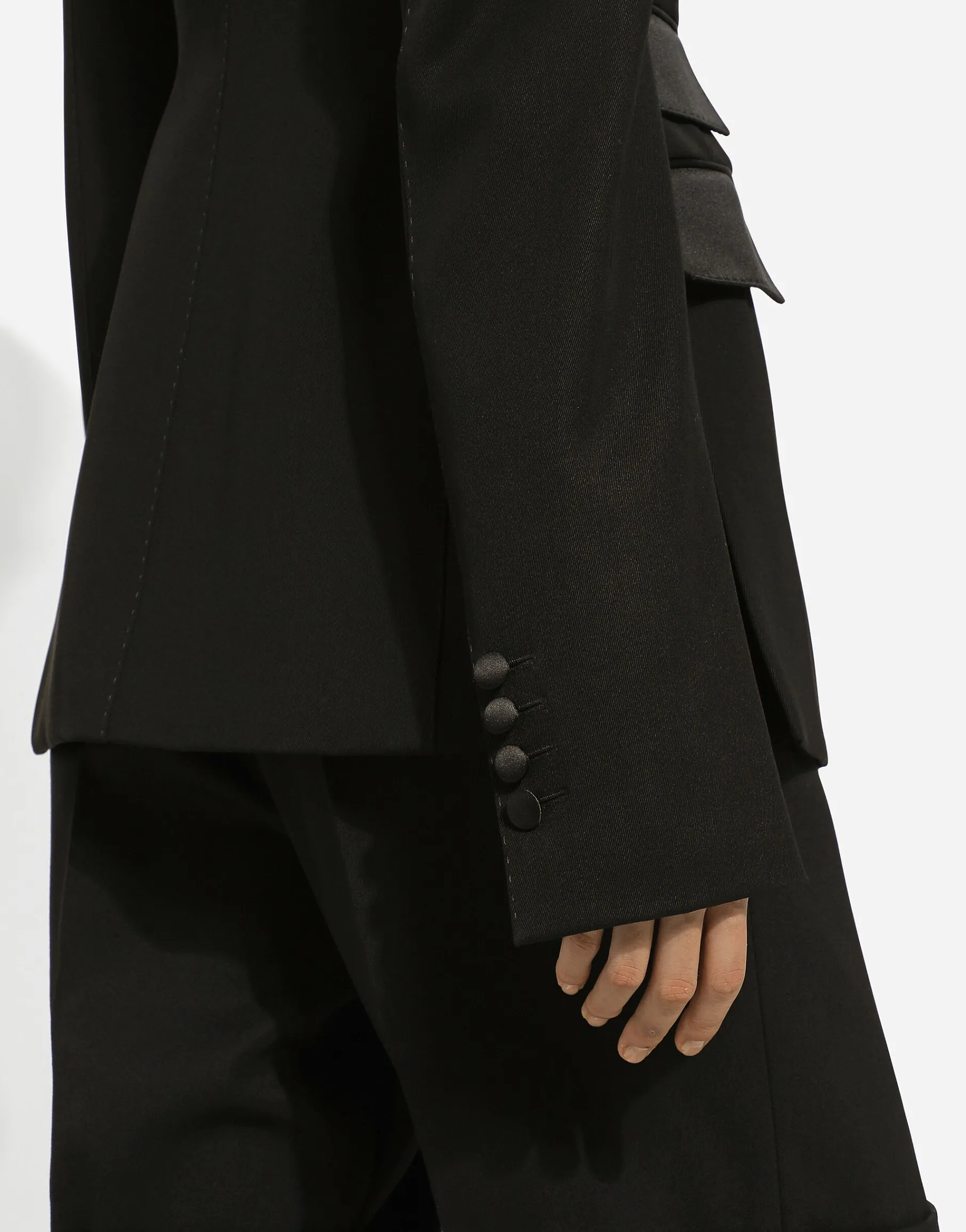 Double-breasted woolen jacket with side vents