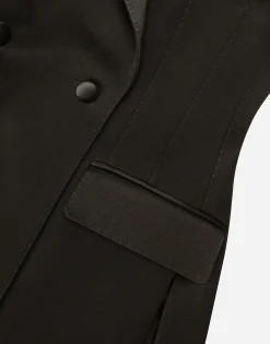Double-breasted woolen jacket with side vents